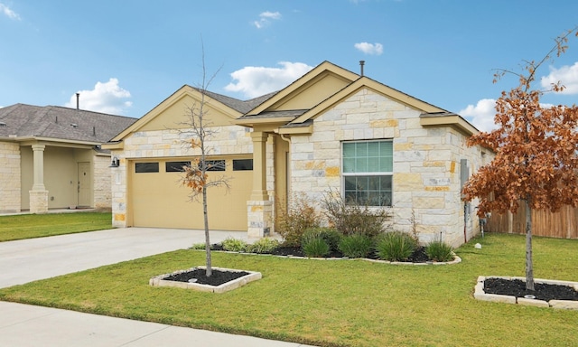 view of front of house with a front yard and a garage