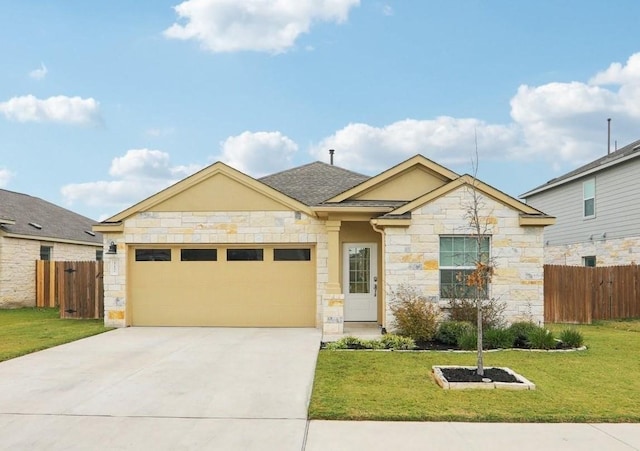 view of front facade featuring a garage and a front yard