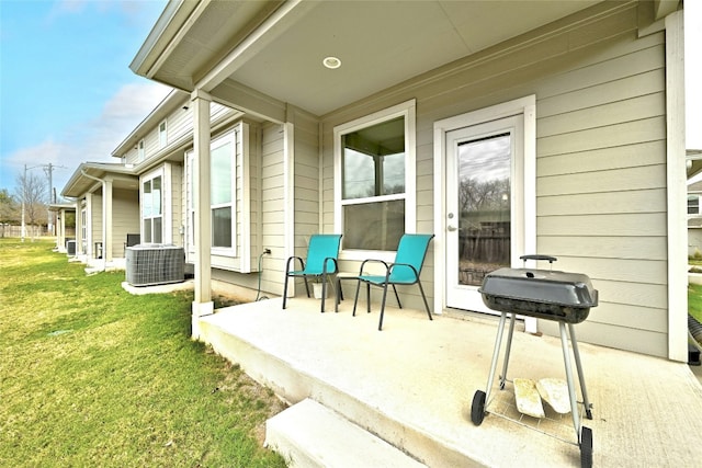 view of patio with central air condition unit and grilling area