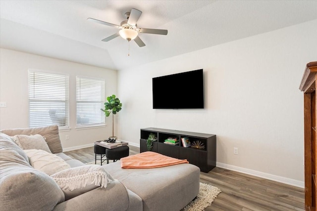 living room with lofted ceiling, wood-type flooring, and ceiling fan