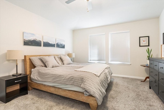 bedroom featuring light carpet and ceiling fan