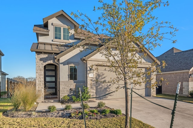 view of front of home featuring a garage