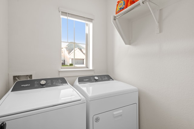 laundry area featuring a mountain view and separate washer and dryer