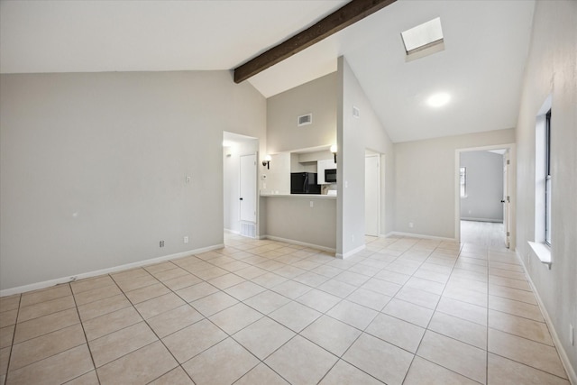 unfurnished living room with high vaulted ceiling, beamed ceiling, and light tile patterned flooring