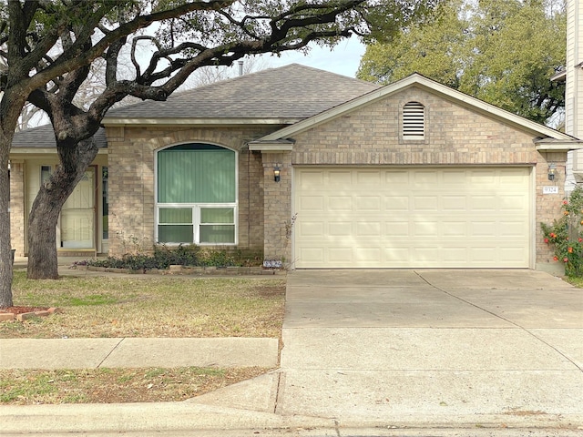 ranch-style home featuring a garage