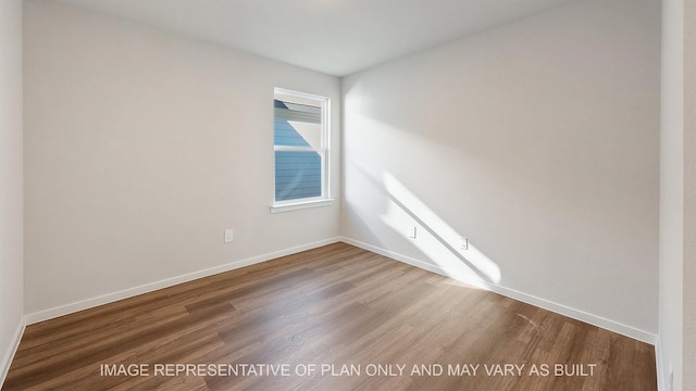 empty room featuring hardwood / wood-style floors