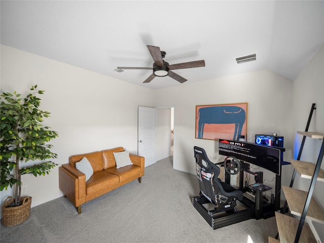 workout area featuring ceiling fan and carpet