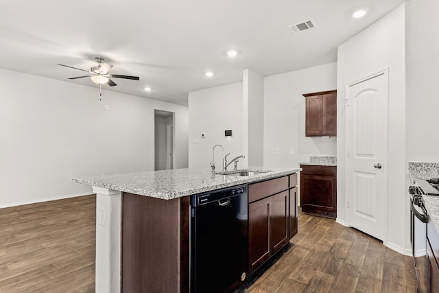 kitchen featuring range, a kitchen island with sink, ceiling fan, black dishwasher, and sink