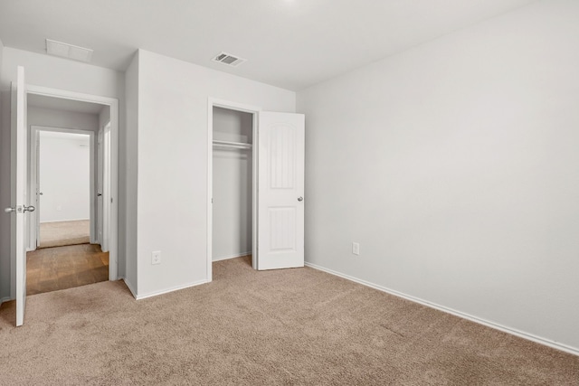 228 Rough Hollow Cv, San Marcos, TX 78666 - unfurnished bedroom with carpet floors and a closet