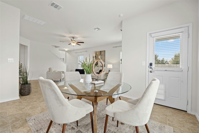 dining area featuring ceiling fan