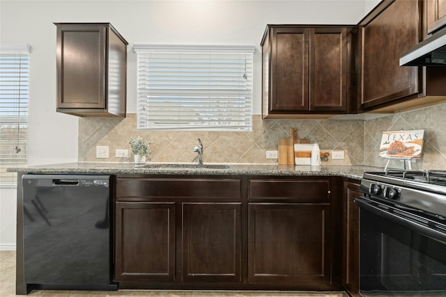 kitchen with dark brown cabinetry, black appliances, decorative backsplash, sink, and light stone counters