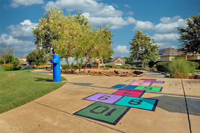 view of community featuring a yard