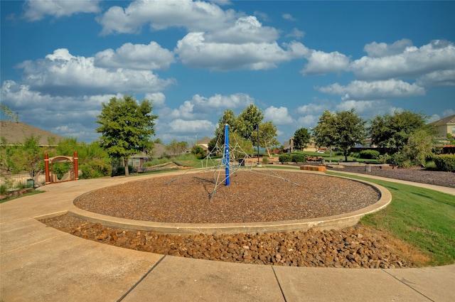 view of property's community with a playground