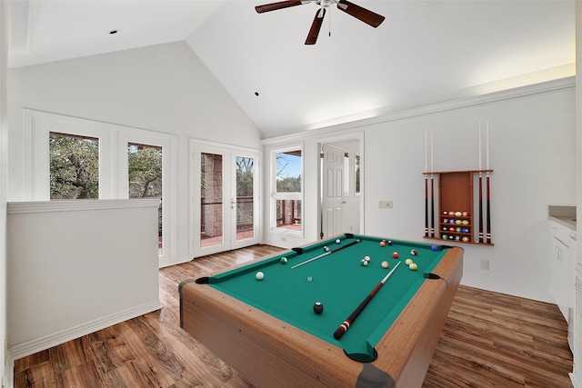 game room with hardwood / wood-style floors, pool table, ceiling fan, french doors, and high vaulted ceiling