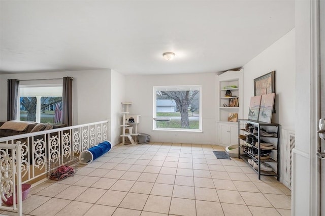 504 Marburger St, Smithville, TX 78957 - empty room with light tile patterned floors and built in features