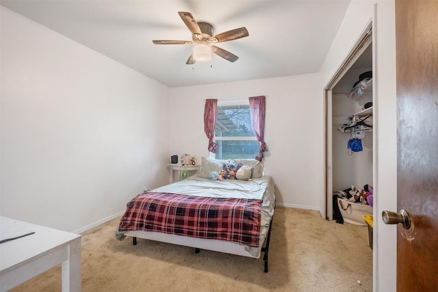 504 Marburger St, Smithville, TX 78957 - bedroom featuring carpet floors, baseboards, and ceiling fan