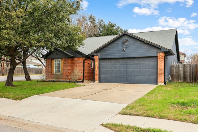 ranch-style home featuring a front yard and a garage