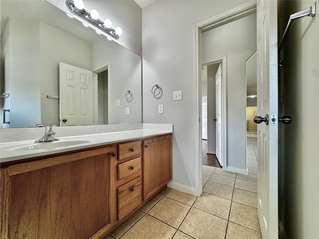 bathroom with vanity and tile patterned floors