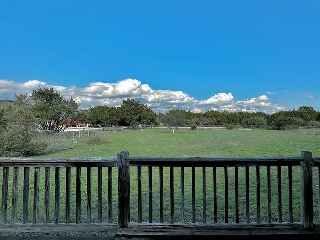 view of yard with a rural view