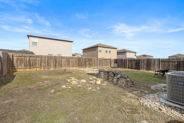 view of yard featuring central AC