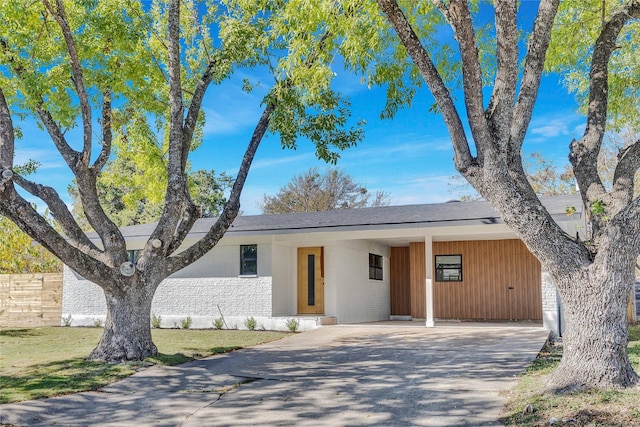 view of front of house featuring a carport