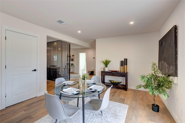 dining area featuring hardwood / wood-style flooring