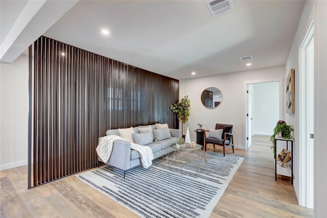 living room with light hardwood / wood-style floors