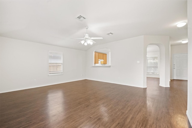 spare room with ceiling fan and dark hardwood / wood-style floors