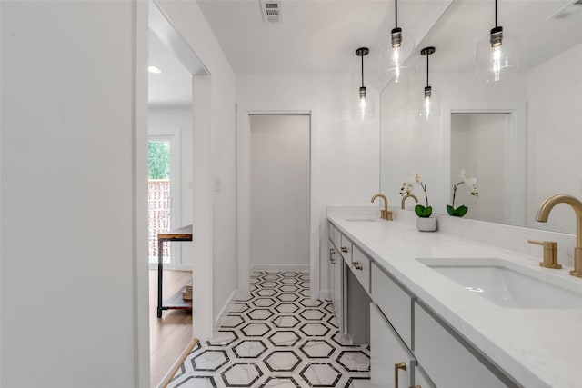 bathroom with a shower and vanity