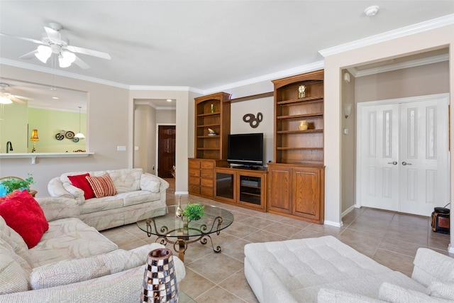 living room with ceiling fan, light tile patterned flooring, and crown molding