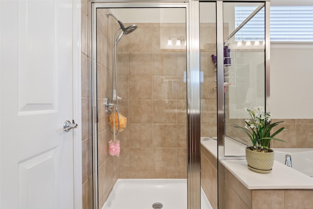 bathroom with an enclosed shower