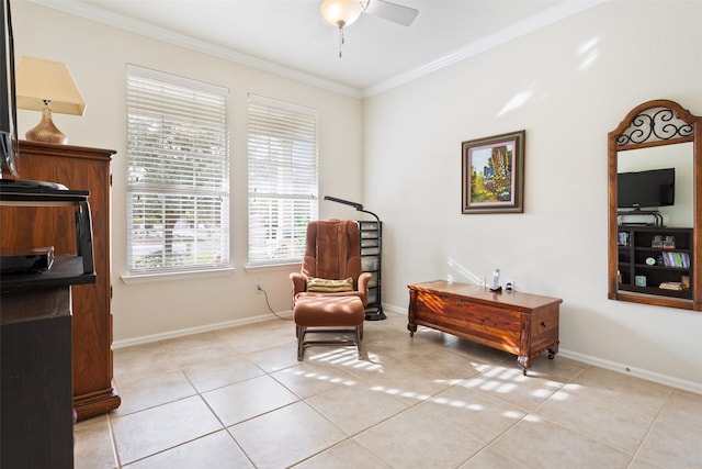 sitting room featuring ceiling fan, crown molding, and light tile patterned flooring