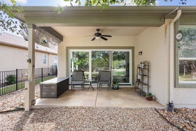 view of patio with ceiling fan