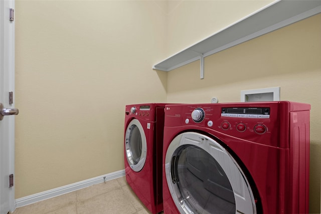 clothes washing area featuring independent washer and dryer