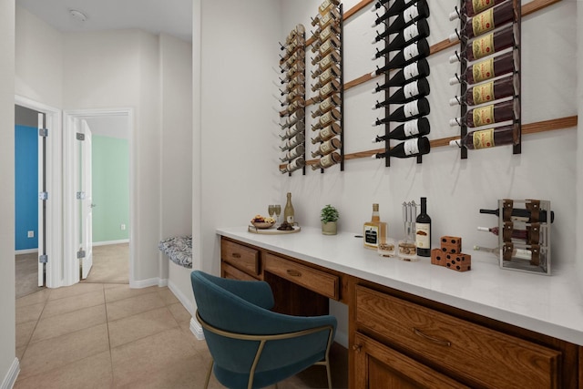 wine cellar featuring light tile patterned floors