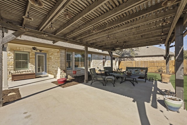 view of patio with an outdoor hangout area and ceiling fan