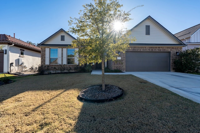 view of front of house with a front lawn and a garage