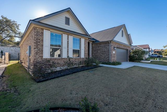 view of front facade with a front yard and a garage