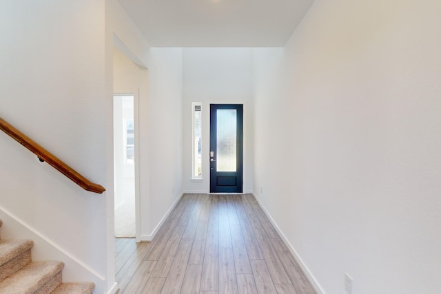 entrance foyer with light hardwood / wood-style flooring