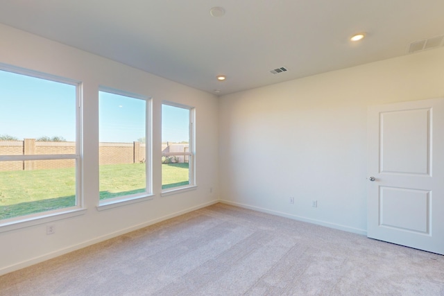 view of carpeted spare room