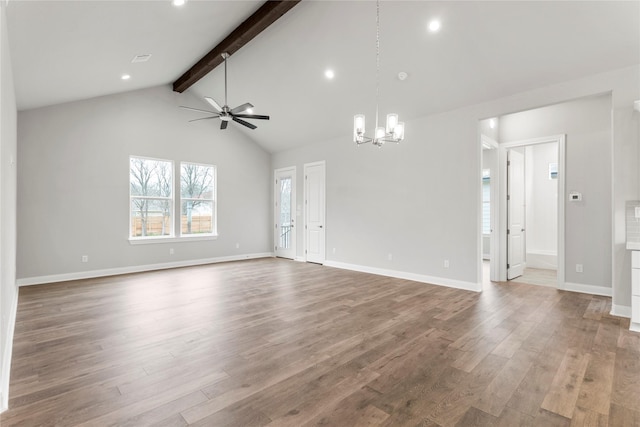 unfurnished living room featuring hardwood / wood-style flooring, ceiling fan with notable chandelier, and lofted ceiling with beams