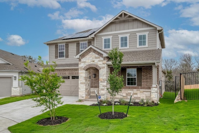 16904 Astral Ln, Manor, TX 78653 - craftsman-style home with stone siding, roof mounted solar panels, driveway, and a garage