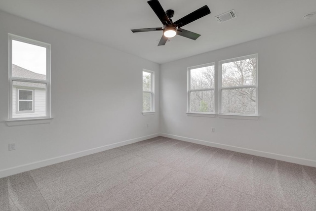 16904 Astral Ln, Manor, TX 78653 - spare room featuring a ceiling fan and light carpet