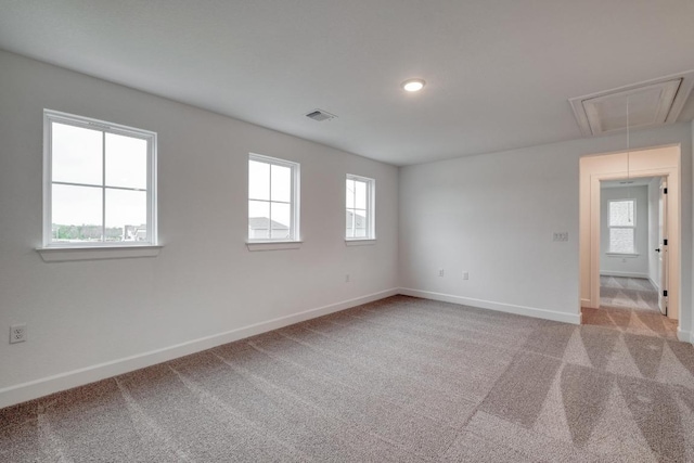 16904 Astral Ln, Manor, TX 78653 - spare room with attic access and carpet floors