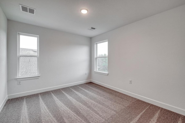 16904 Astral Ln, Manor, TX 78653 - carpeted spare room featuring baseboards