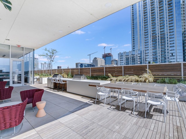 view of patio featuring an outdoor bar