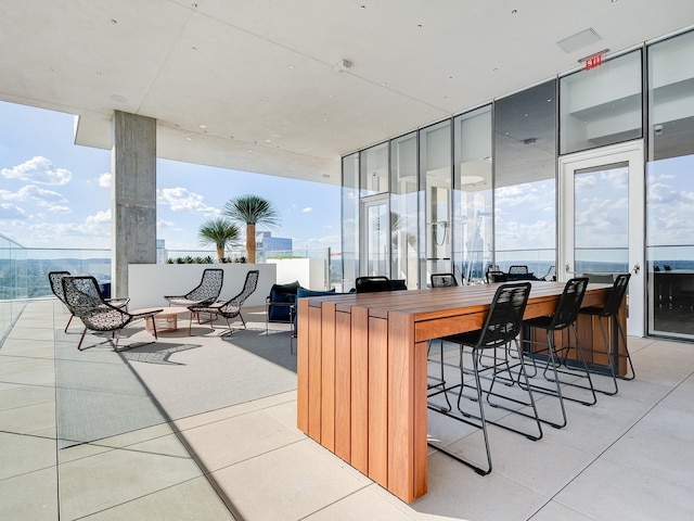 view of patio featuring exterior bar