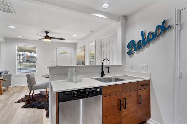 kitchen with sink, light hardwood / wood-style floors, ceiling fan, and dishwasher