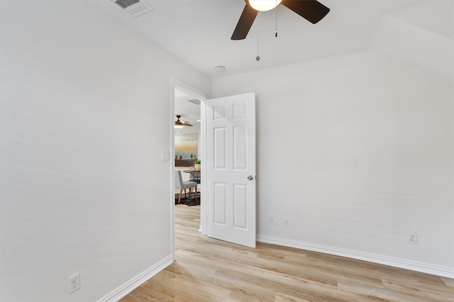 unfurnished room featuring ceiling fan and light wood-type flooring