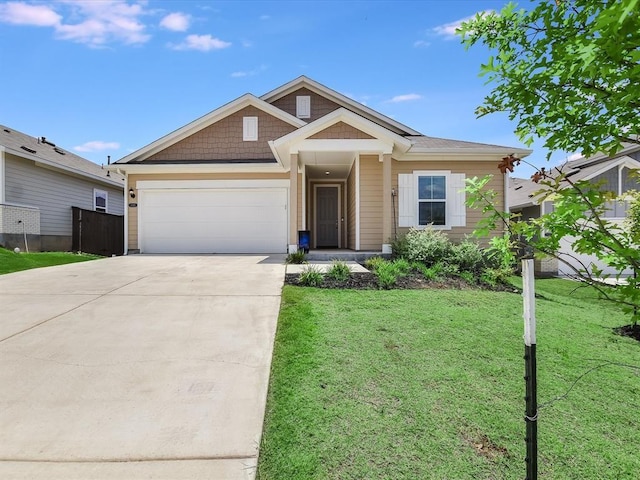 craftsman-style home featuring a front lawn